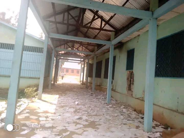 Debris-strewn corridor of the damaged mission buildings